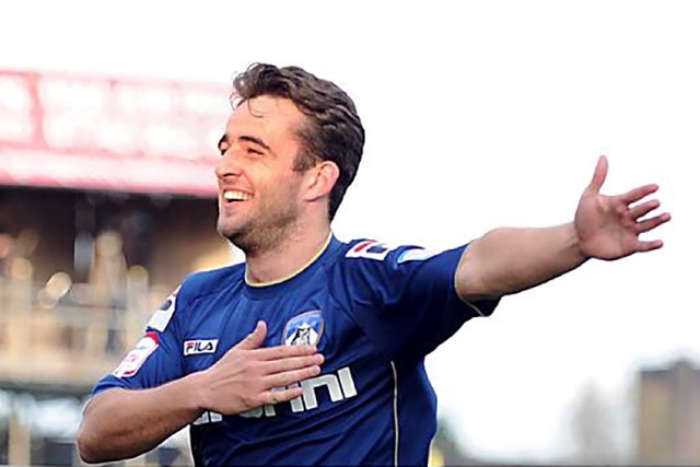 Surridge and Baxter help Latics sail away from Grimsby with win