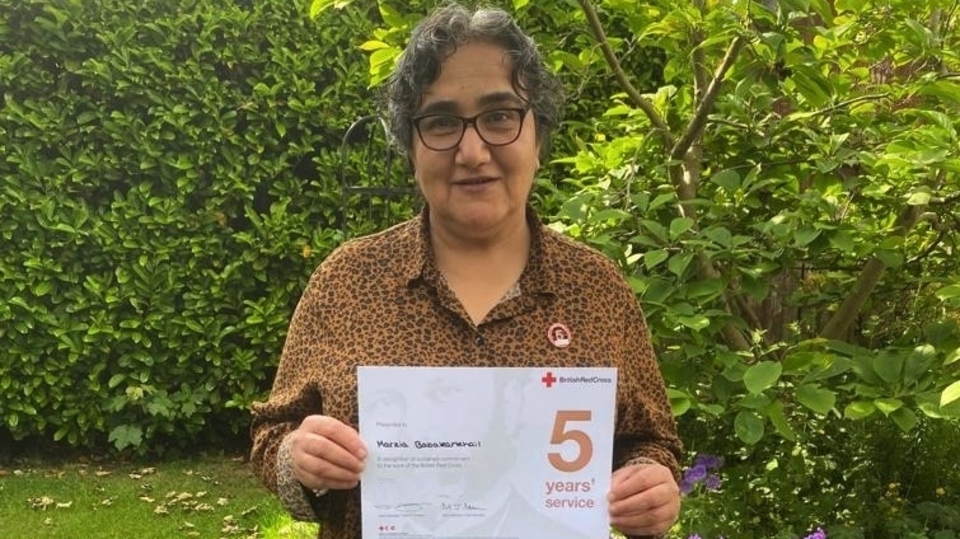 Former refugee now based in Oldham is honoured by British Red Cross for voluntary service