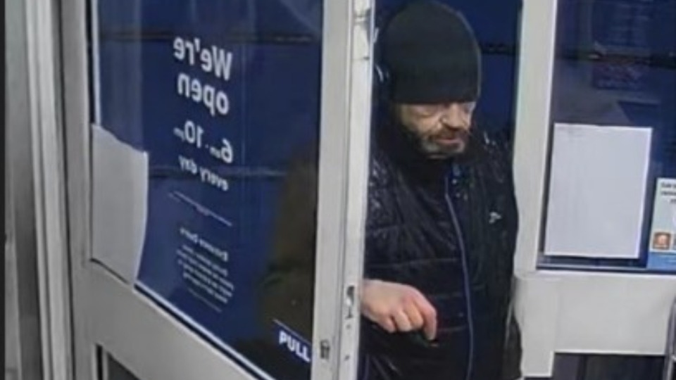 Man sought after store staff member was threatened with an axe