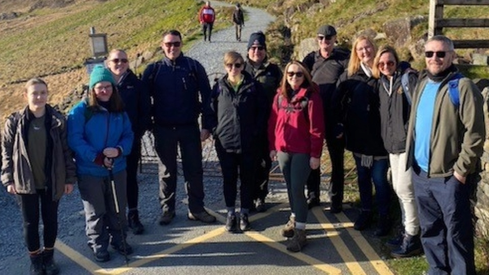 Uppermill brass band conquer Snowdon in ground-breaking charity climb