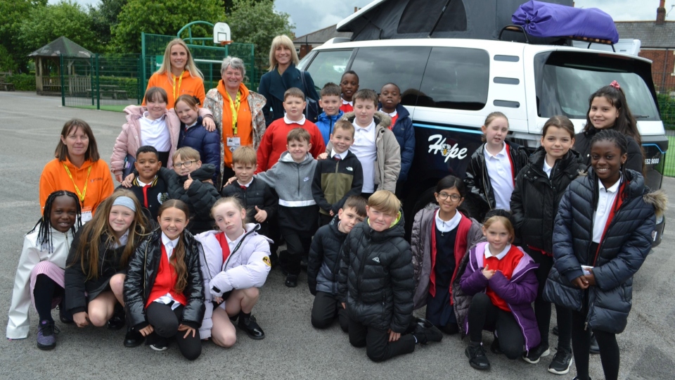 Oasis kids win competition to name anti-poverty van