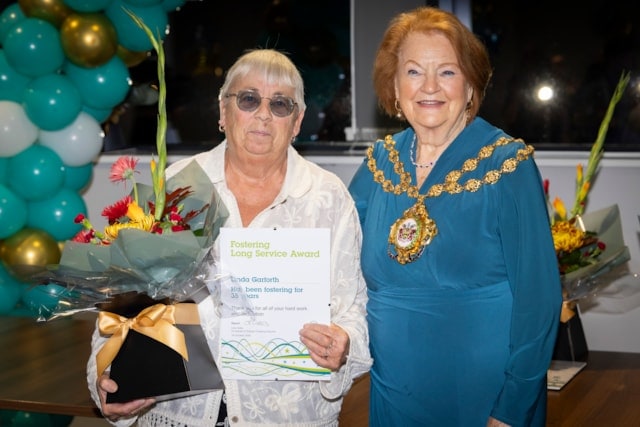Linda Garforth honoured for 35 years of dedication at Oldham fostering awards